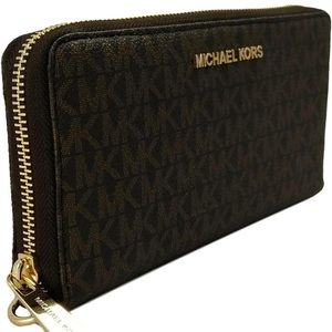 Michael Kors PVC wristlet 9x4 inches